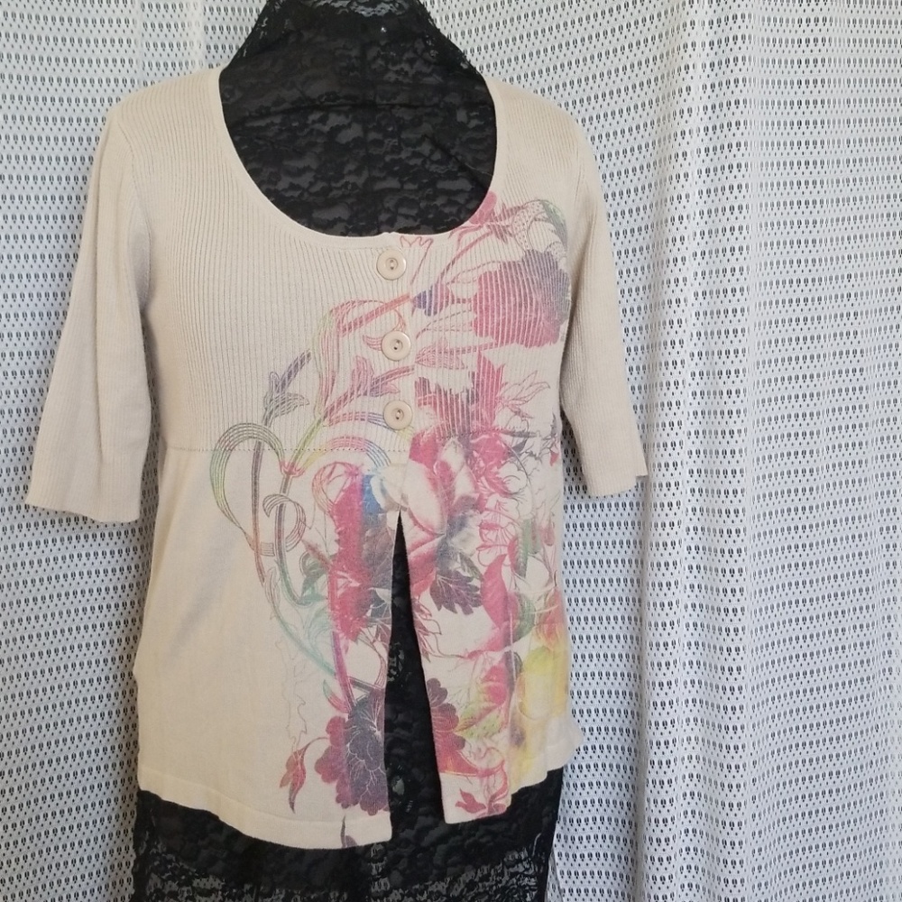 Short sleeve cardigan.